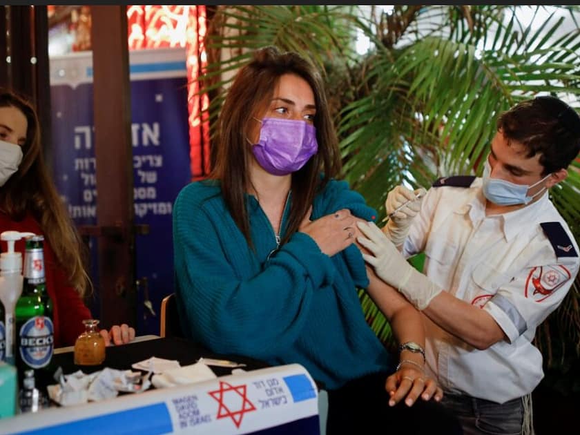 Israeli woman is injected by police in a bar