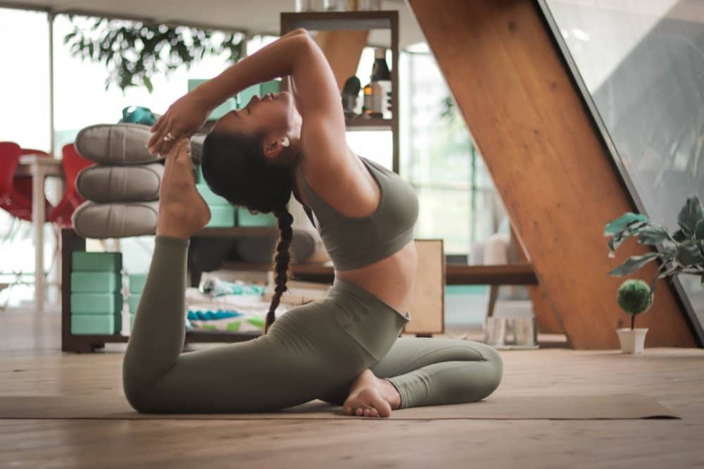 a woman performing yoga
